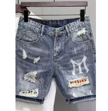 Short d'été léger et ample en jean déchiré cinq points